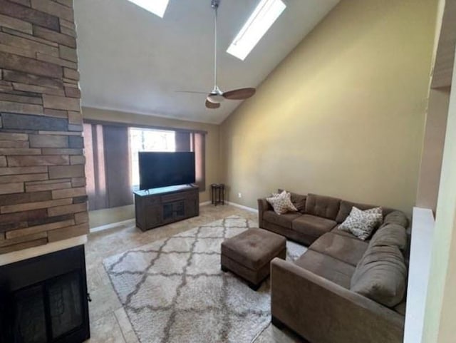 88 Nipmuc Trl Unit C, North Providence, RI 02904 - living room with a fireplace, a skylight, high vaulted ceiling, and a ceiling fan
