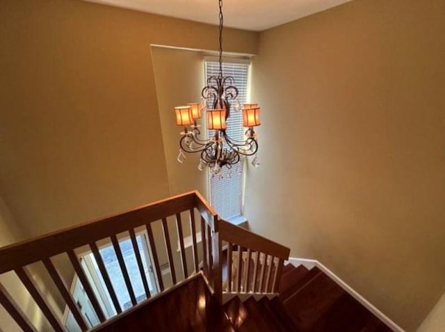 88 Nipmuc Trl Unit C, North Providence, RI 02904 - stairway featuring a chandelier and wood finished floors