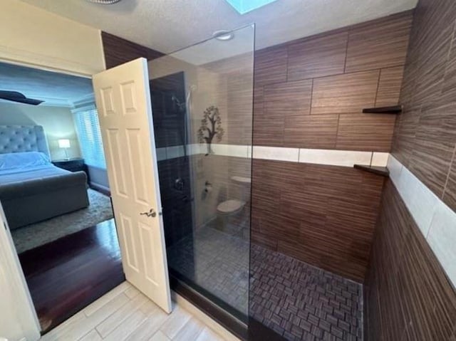 88 Nipmuc Trl Unit C, North Providence, RI 02904 - ensuite bathroom with walk in shower and a skylight
