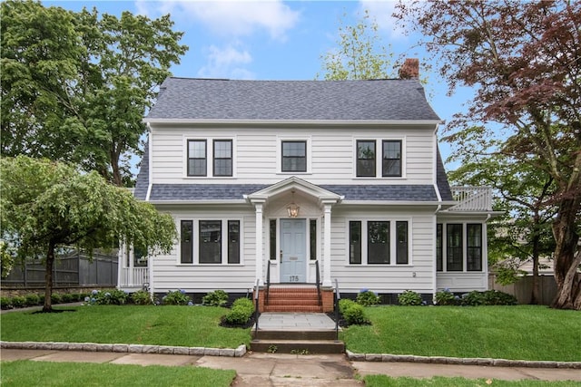 175 Freeman Pkwy, Providence, RI 02906 - view of front of property featuring a shingled roof and a chimney