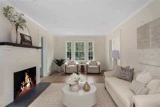 175 Freeman Pkwy, Providence, RI 02906 - living area with a brick fireplace, wood finished floors, and ornamental molding