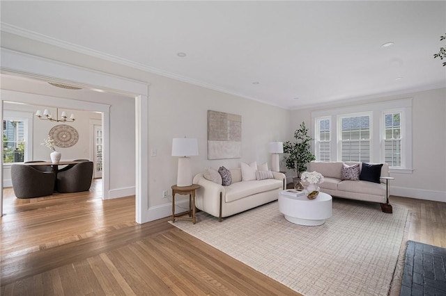 175 Freeman Pkwy, Providence, RI 02906 - living room with a chandelier, wood finished floors, and ornamental molding