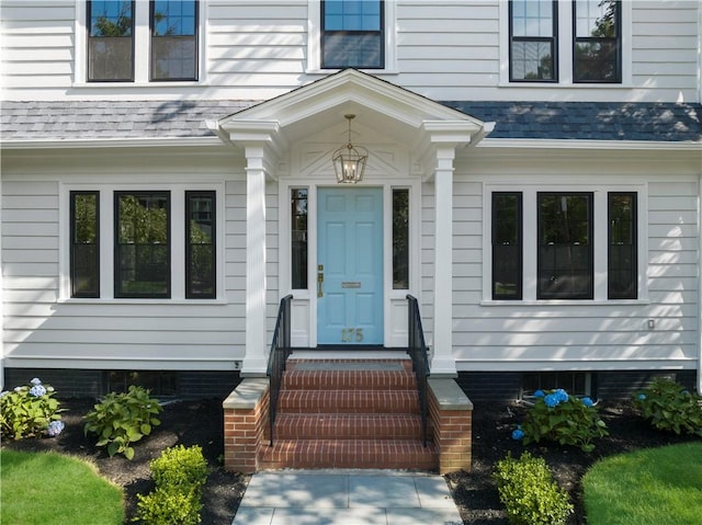 175 Freeman Pkwy, Providence, RI 02906 - property entrance with roof with shingles