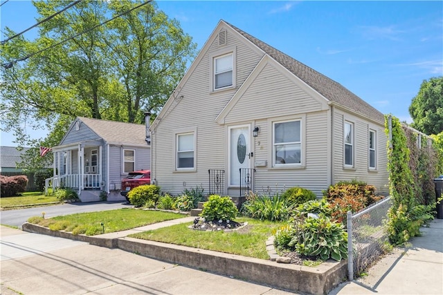 75 Crescent Ave, Cranston, RI 02910 - bungalow-style house featuring a front lawn