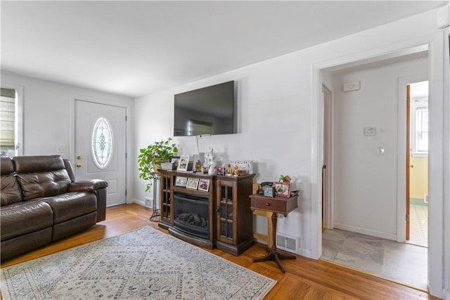 75 Crescent Ave, Cranston, RI 02910 - living room with baseboards and wood finished floors