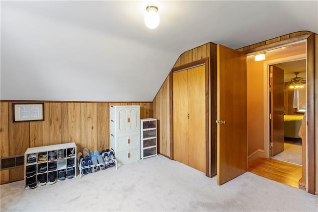 75 Crescent Ave, Cranston, RI 02910 - additional living space featuring lofted ceiling, carpet floors, a ceiling fan, and wood walls