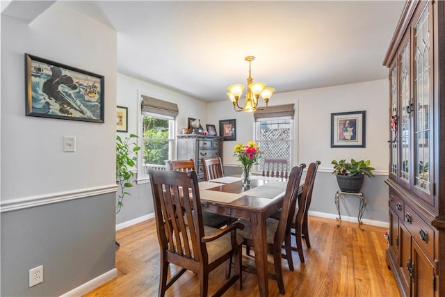 75 Crescent Ave, Cranston, RI 02910 - dining space featuring a chandelier and light wood-type flooring