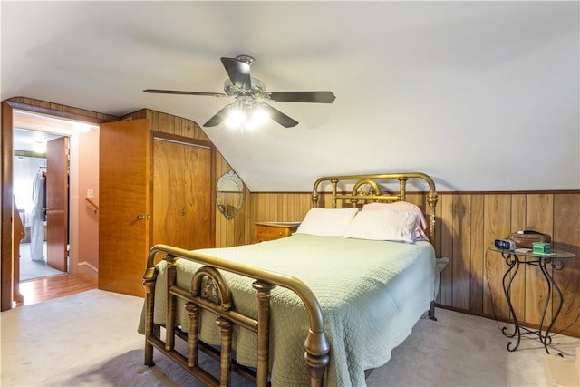 75 Crescent Ave, Cranston, RI 02910 - bedroom featuring wood walls, lofted ceiling, light carpet, a ceiling fan, and a closet