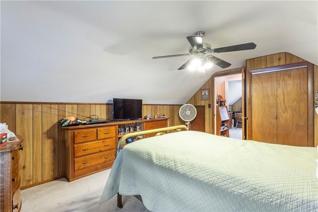 75 Crescent Ave, Cranston, RI 02910 - bedroom with wooden walls, light carpet, vaulted ceiling, and ceiling fan