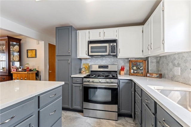 75 Crescent Ave, Cranston, RI 02910 - kitchen featuring appliances with stainless steel finishes, gray cabinetry, and light countertops