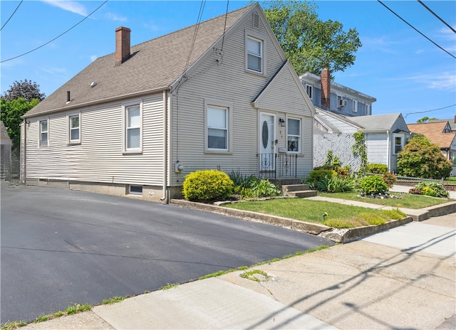 75 Crescent Ave, Cranston, RI 02910 - view of front of home featuring a chimney