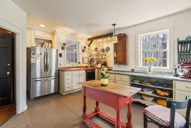 15 N Main St, Freetown, MA 02702 - kitchen featuring freestanding refrigerator, wooden counters, pendant lighting, dishwasher, and recessed lighting