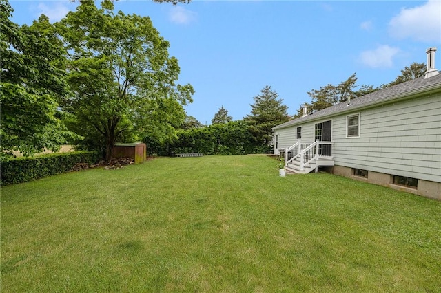 120 Landis Dr, Warwick, RI 02818 - view of green lawn with a shed