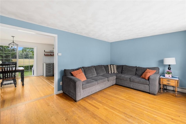 120 Landis Dr, Warwick, RI 02818 - living area with light wood-type flooring and baseboards