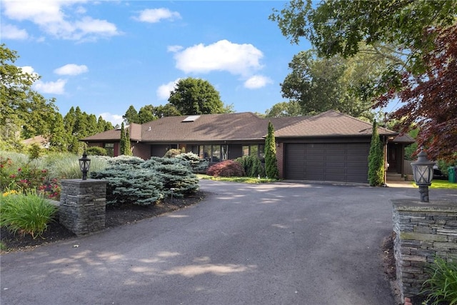 788 Namquid Dr, Warwick, RI 02888 - ranch-style house featuring a garage and asphalt driveway