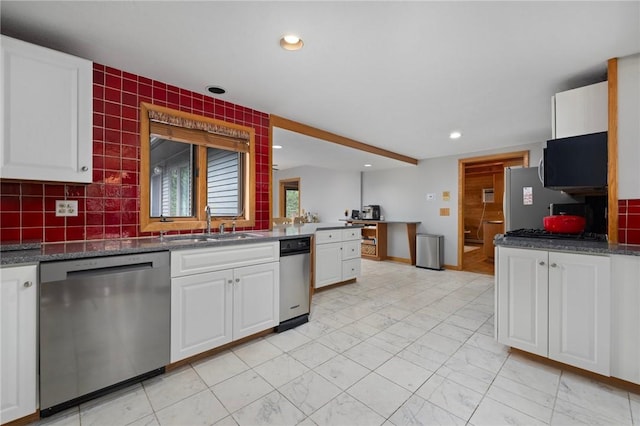 788 Namquid Dr, Warwick, RI 02888 - kitchen featuring appliances with stainless steel finishes, white cabinets, decorative backsplash, and recessed lighting