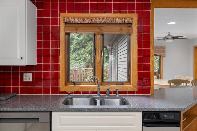 788 Namquid Dr, Warwick, RI 02888 - kitchen featuring stainless steel dishwasher, white cabinets, backsplash, and a ceiling fan
