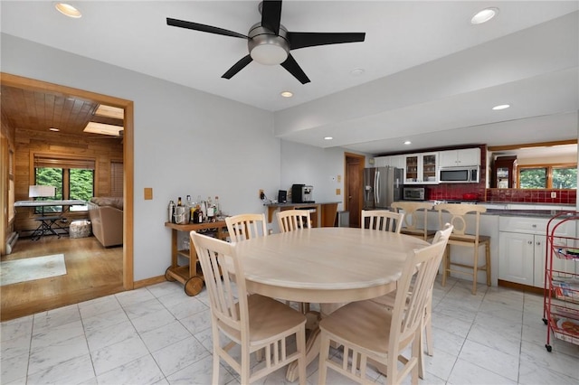 788 Namquid Dr, Warwick, RI 02888 - dining area with light marble finish floors, plenty of natural light, recessed lighting, and a ceiling fan