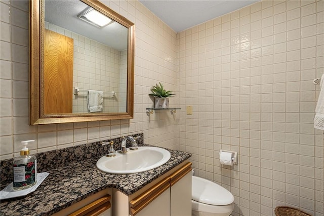 788 Namquid Dr, Warwick, RI 02888 - half bath with tile walls, vanity, and decorative backsplash