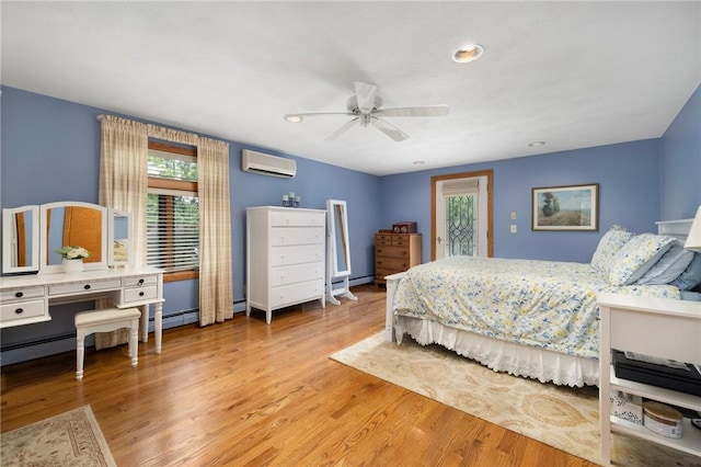 788 Namquid Dr, Warwick, RI 02888 - bedroom featuring a wall mounted AC, wood finished floors, recessed lighting, and a ceiling fan