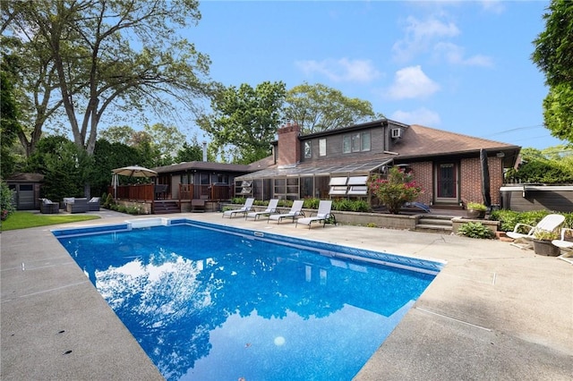 788 Namquid Dr, Warwick, RI 02888 - swimming pool featuring a patio area, a wooden deck, and an outdoor living space
