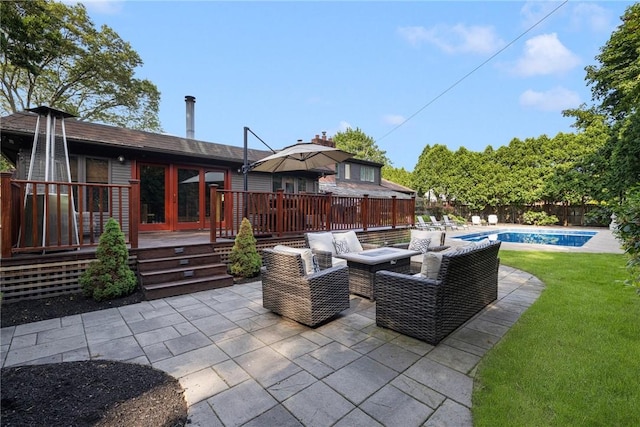788 Namquid Dr, Warwick, RI 02888 - fenced backyard with a wooden deck, outdoor lounge area, and a patio area