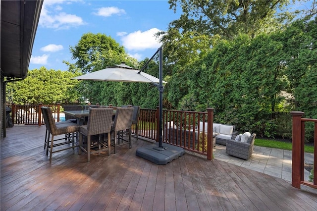 788 Namquid Dr, Warwick, RI 02888 - wooden deck with an outdoor living space and outdoor dining space