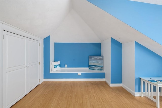 788 Namquid Dr, Warwick, RI 02888 - additional living space with wood finished floors and vaulted ceiling