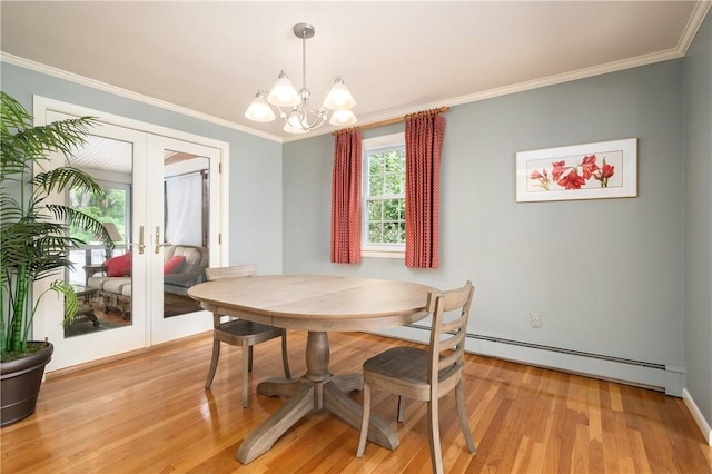 70 High Ridge Dr, Cumberland, RI 02864 - dining area with french doors, crown molding, a baseboard heating unit, a chandelier, and light wood-type flooring