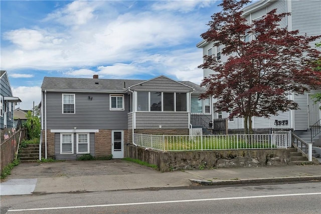 101 Benefit St, Pawtucket, RI 02860 - view of front of property featuring stairs and a chimney