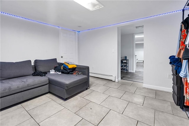 101 Benefit St, Pawtucket, RI 02860 - living area featuring a baseboard radiator and light tile patterned flooring