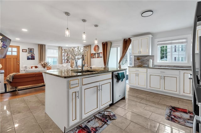 101 Benefit St, Pawtucket, RI 02860 - kitchen featuring stainless steel dishwasher, plenty of natural light, white cabinets, dark stone counters, and recessed lighting