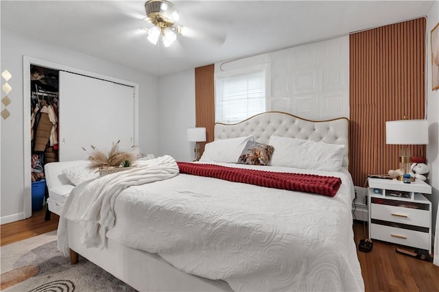 101 Benefit St, Pawtucket, RI 02860 - bedroom with wood finished floors, a closet, a ceiling fan, and baseboard heating