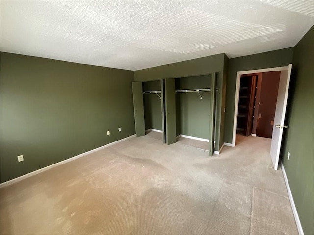 511 Child St Unit 101, Warren, RI 02885 - unfurnished bedroom with light carpet and two closets