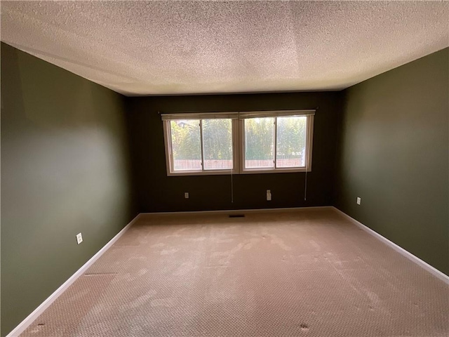 511 Child St Unit 101, Warren, RI 02885 - unfurnished room featuring light colored carpet and a textured ceiling