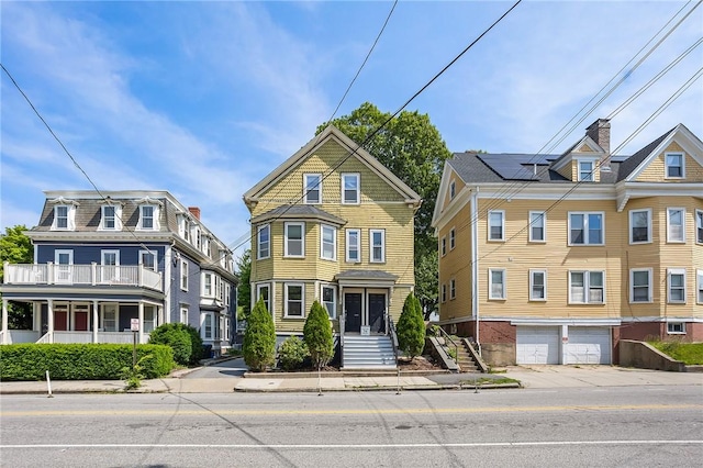 224 Olney St Unit 1, Providence, RI 02906 - view of front of home featuring a garage