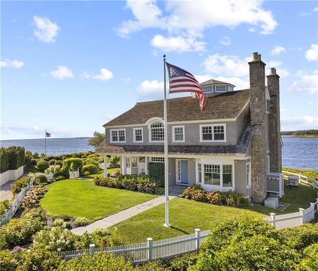 9 Arraquat Rd, Westerly, RI 02891 - view of front of home with a water view and a chimney
