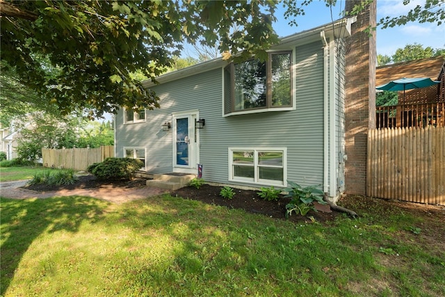 11 Burr Ave, Barrington, RI 02806 - split foyer home featuring a chimney