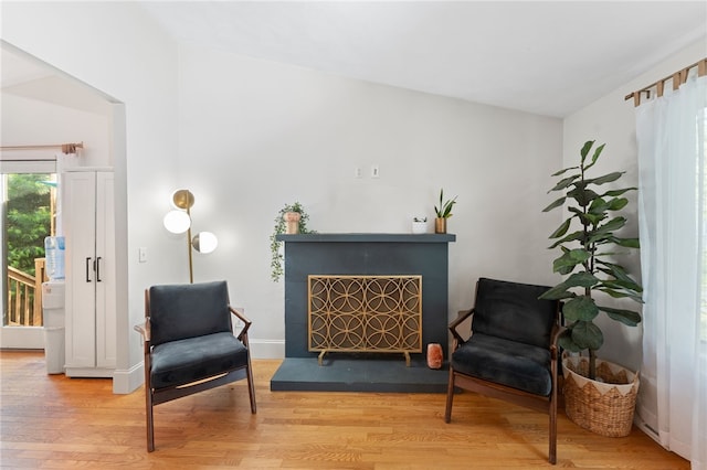 11 Burr Ave, Barrington, RI 02806 - sitting room with wood finished floors and a fireplace