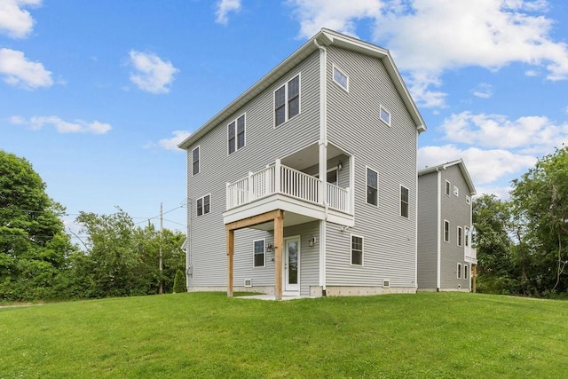 15 Spadina Ave, Warwick, RI 02889 - rear view of house with a lawn and a balcony