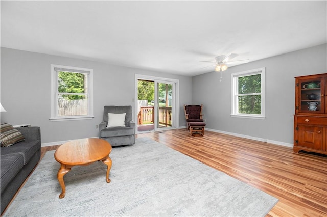 200 Heroux Blvd Unit 908, Cumberland, RI 02864 - living area with light wood-type flooring, healthy amount of natural light, and ceiling fan