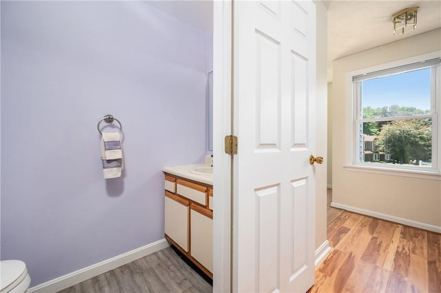 200 Heroux Blvd Unit 908, Cumberland, RI 02864 - bathroom with vanity and wood finished floors