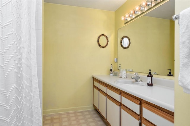 200 Heroux Blvd Unit 908, Cumberland, RI 02864 - bathroom with vanity, tile patterned floors, and a shower with curtain