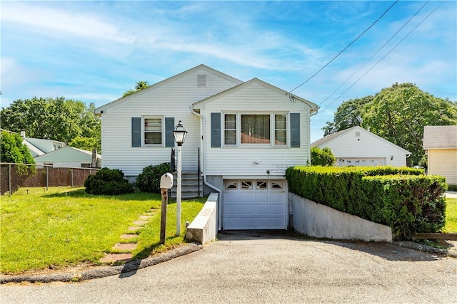 111 Belgium St, Cranston, RI 02920 - view of front of home with driveway and a garage