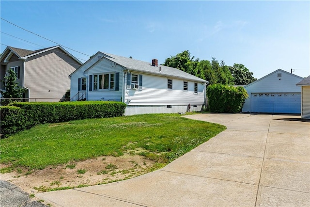 111 Belgium St, Cranston, RI 02920 - view of front of property featuring a detached garage, a front lawn, a chimney, and cooling unit