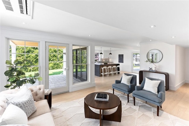 35 Coggeshall Ave, Newport, RI 02840 - living room with light wood finished floors and recessed lighting