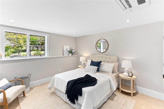 35 Coggeshall Ave, Newport, RI 02840 - bedroom with wood finished floors and recessed lighting