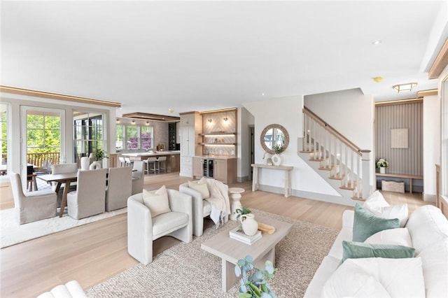 35 Coggeshall Ave, Newport, RI 02840 - living room featuring light wood-style floors, stairway, wine cooler, and recessed lighting