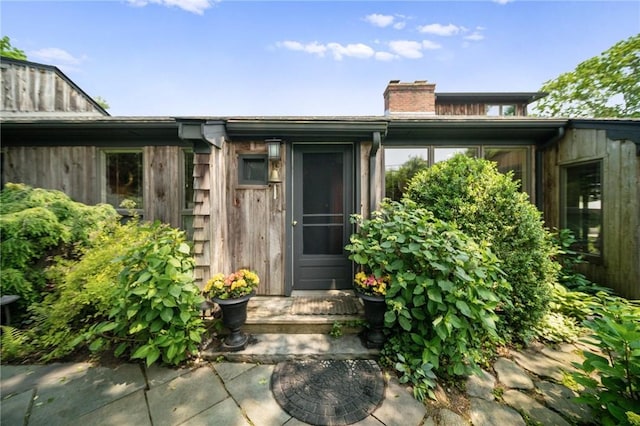 20 Wagner Rd, Westerly, RI 02891 - doorway to property with a chimney