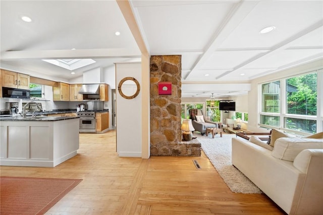 20 Wagner Rd, Westerly, RI 02891 - living area featuring light wood-style floors, a skylight, recessed lighting, and beamed ceiling